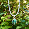 "Moana (Ocean)" Chrysoberyl (Cat's Eye) 1" Pendant on a  16" Aquamarine Beaded Necklace